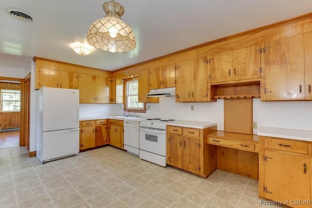 kitchen featuring white appliances, light floors, visible vents, and under cabinet range hood