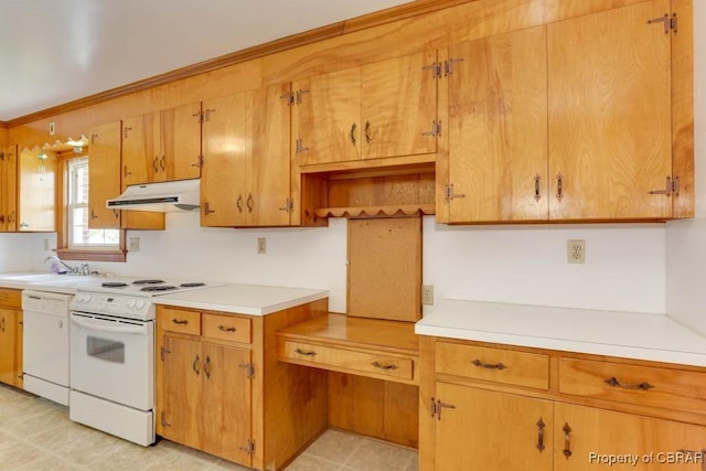 kitchen with brown cabinets, under cabinet range hood, a sink, white appliances, and light countertops