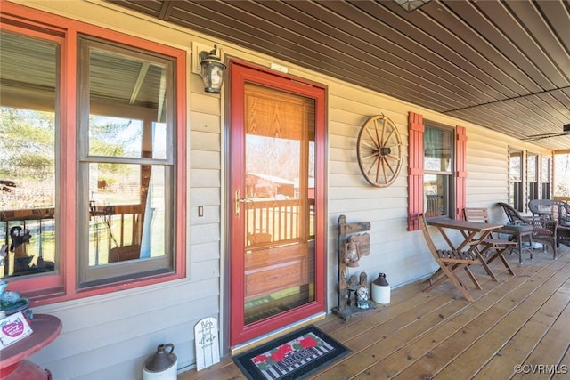 entrance to property featuring a porch