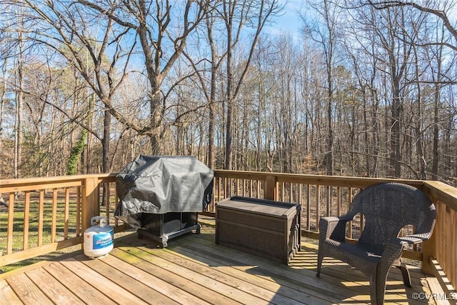 wooden deck with area for grilling