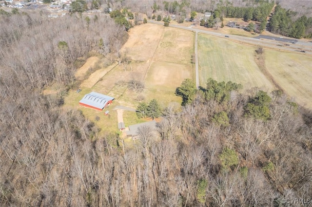 birds eye view of property featuring a rural view