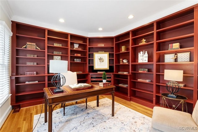 office area with light wood-style flooring, recessed lighting, and ornamental molding