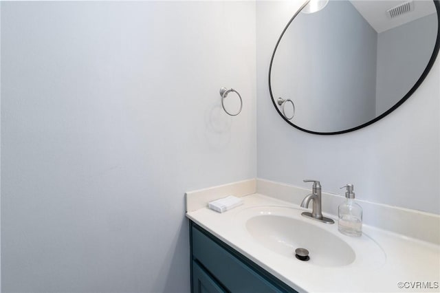 bathroom featuring visible vents and vanity