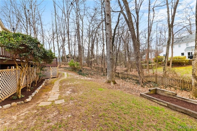 view of yard with fence