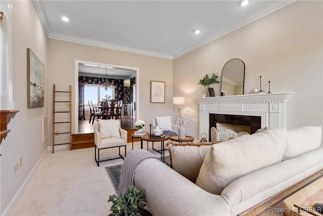 living area with light carpet, a glass covered fireplace, baseboards, and ornamental molding