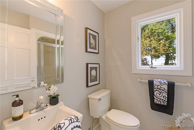 bathroom featuring a sink and toilet