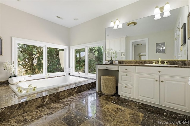 full bath with a bath, visible vents, marble finish floor, and vanity