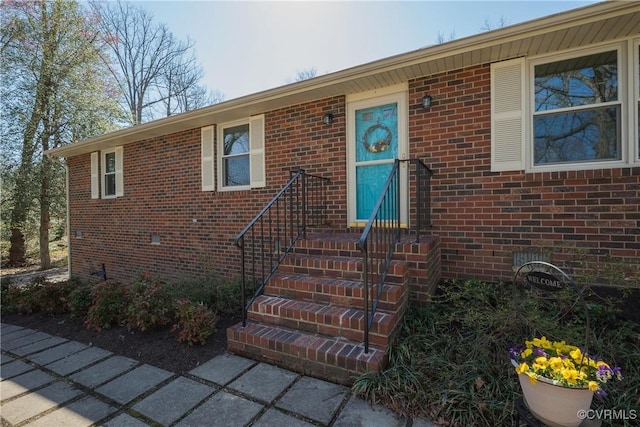 view of front facade featuring brick siding