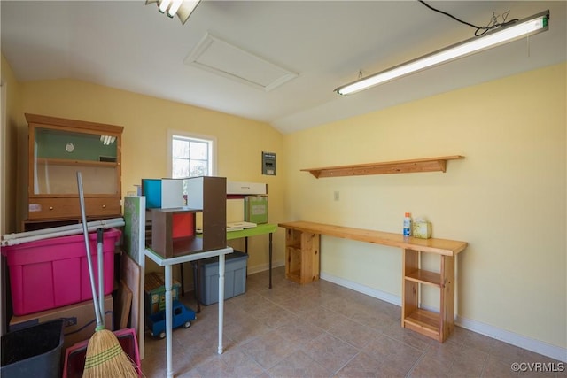 below grade area with tile patterned floors and baseboards