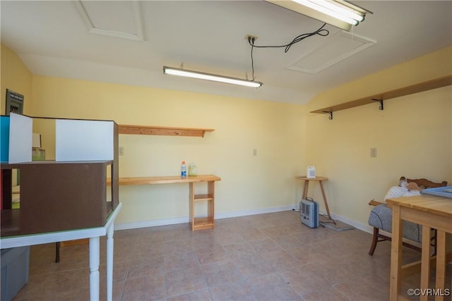 garage featuring baseboards