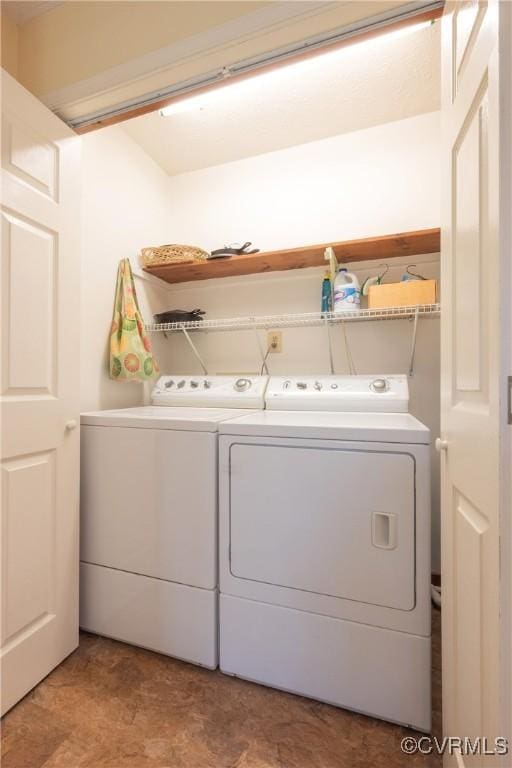 clothes washing area with laundry area and independent washer and dryer