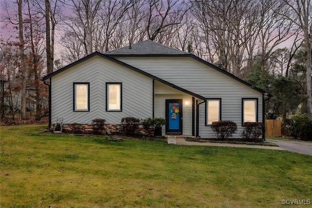 view of front of property with a front lawn