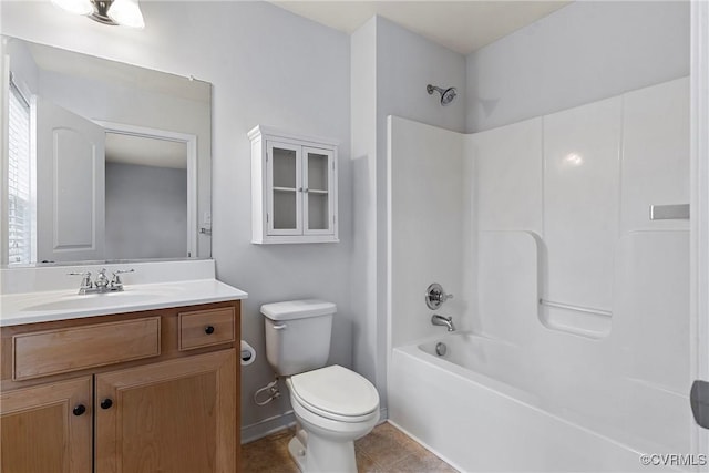 full bath featuring vanity, tile patterned floors, toilet, and bathtub / shower combination