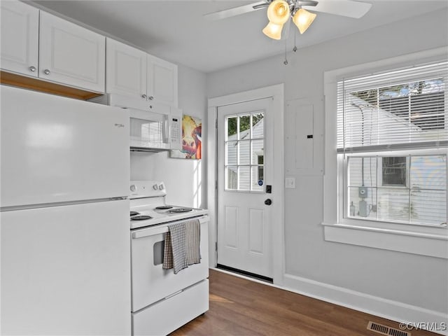 kitchen featuring visible vents, baseboards, dark wood-style floors, white appliances, and white cabinetry