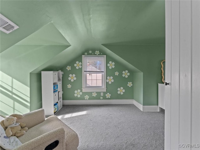 bonus room featuring visible vents, carpet floors, baseboards, and vaulted ceiling