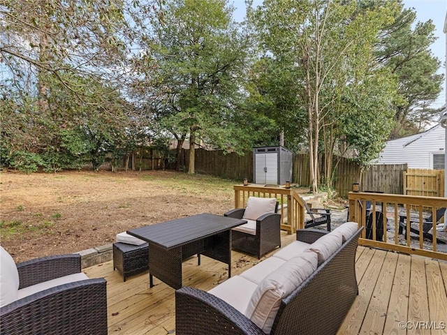 wooden deck with a fenced backyard, a shed, an outdoor hangout area, and an outdoor structure