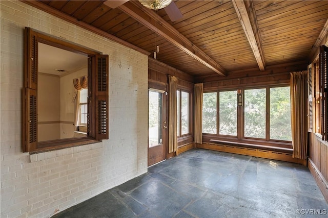 unfurnished sunroom with wooden ceiling and beamed ceiling