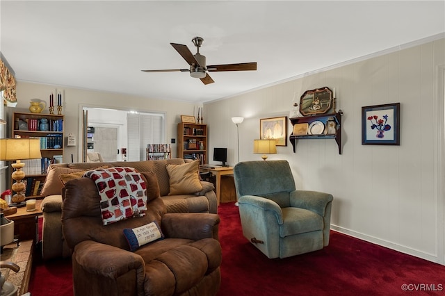 living area with carpet flooring and a ceiling fan