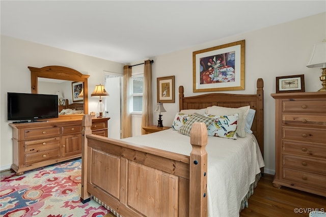 bedroom featuring light wood-style flooring