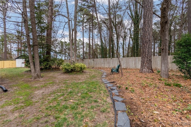 view of yard featuring a fenced backyard