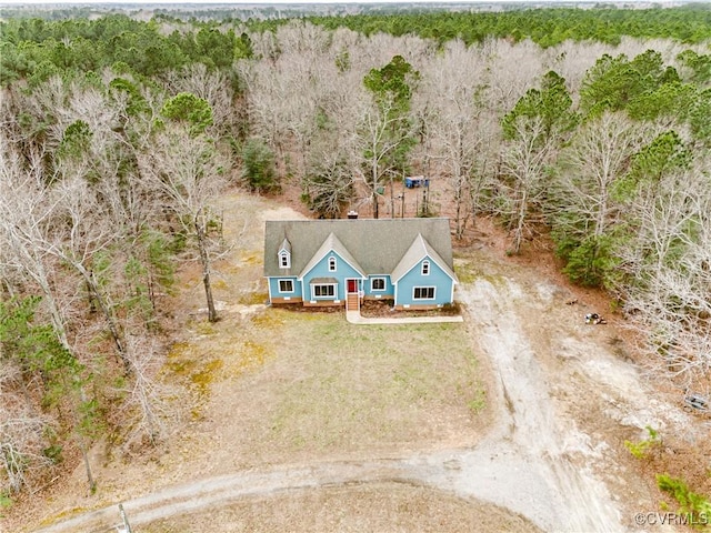 aerial view with a wooded view