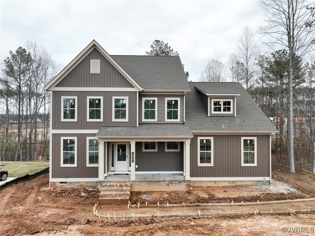 view of front of property featuring crawl space, a porch, and roof with shingles