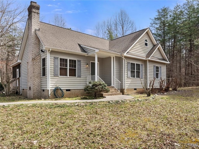 view of front facade with crawl space, a front lawn, roof with shingles, and a chimney