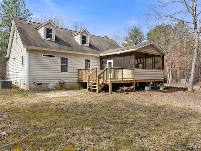 back of house with roof with shingles, central air condition unit, a sunroom, and crawl space