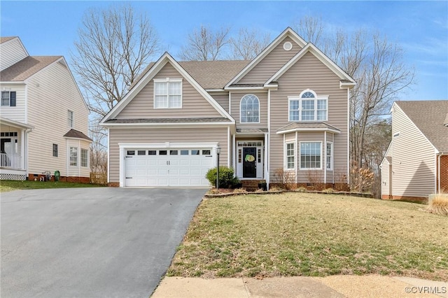 traditional home with crawl space, a front yard, roof with shingles, and driveway