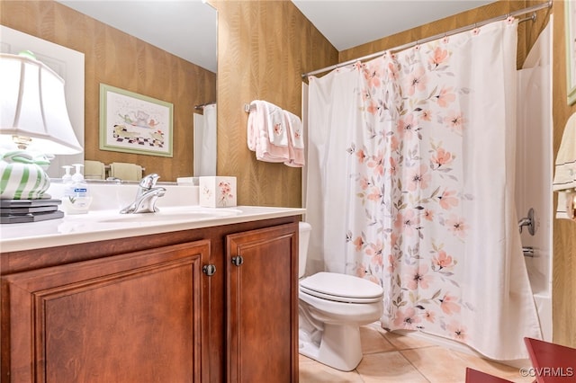 bathroom with wallpapered walls, toilet, a shower with shower curtain, tile patterned floors, and vanity