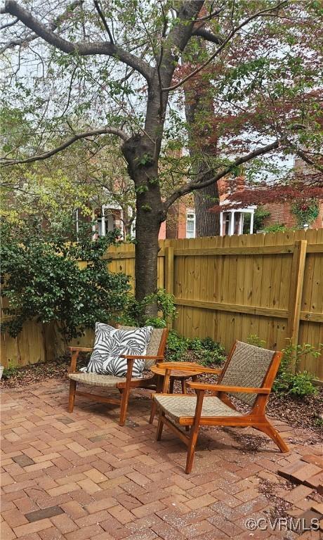 view of patio / terrace with fence
