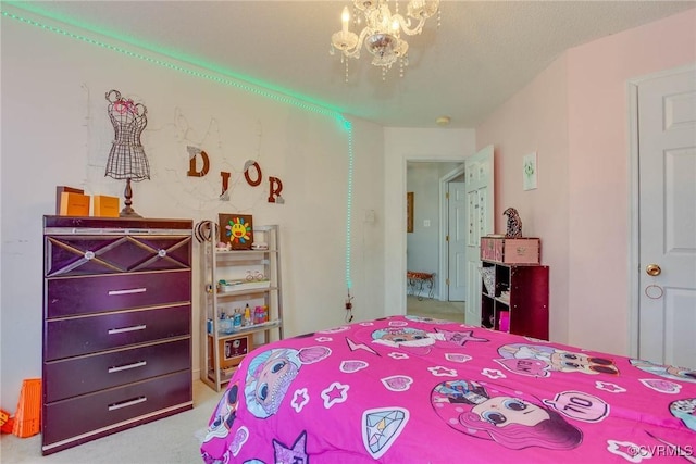 bedroom featuring an inviting chandelier and carpet