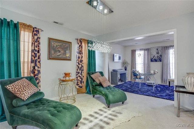 carpeted bedroom with visible vents