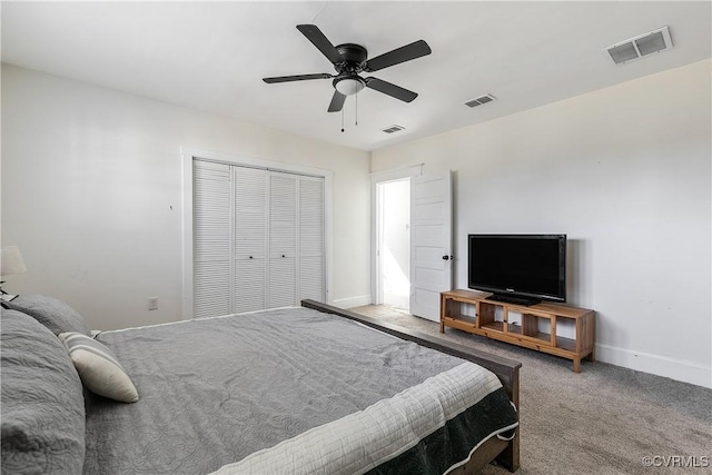 bedroom with visible vents, baseboards, and carpet