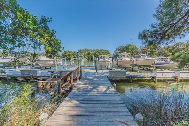 dock area featuring a water view and boat lift