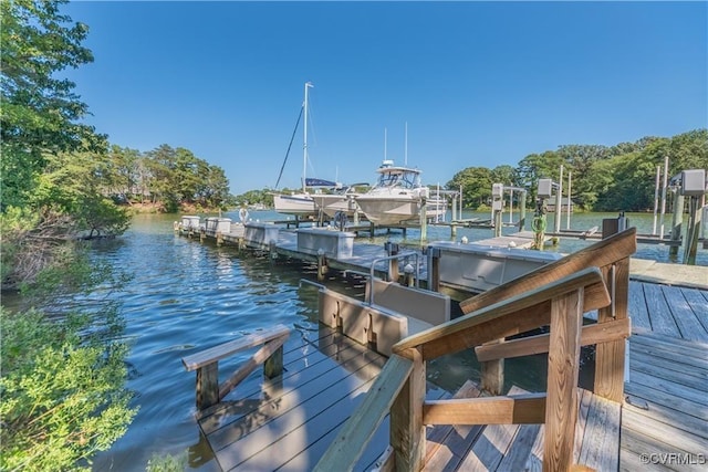 dock area featuring a water view and boat lift