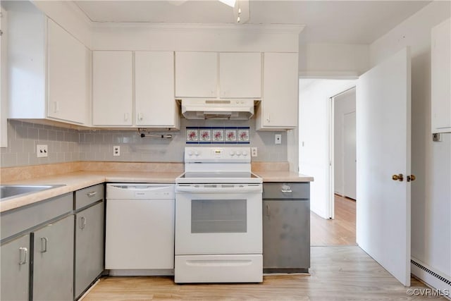 kitchen featuring under cabinet range hood, white appliances, light wood-style floors, and a baseboard radiator