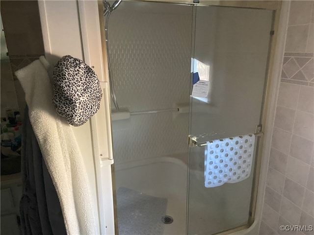 bathroom featuring a stall shower