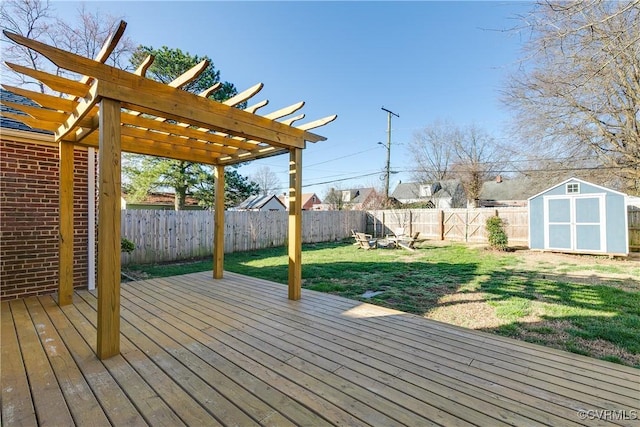 wooden terrace featuring an outbuilding, a yard, a fenced backyard, a pergola, and a storage shed