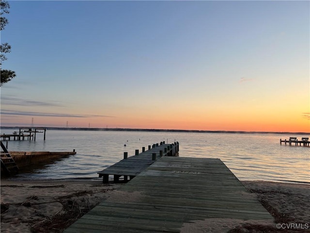 dock area featuring a water view