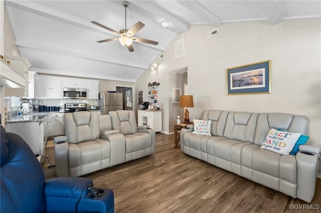 living room with lofted ceiling with beams, visible vents, dark wood-type flooring, and a ceiling fan