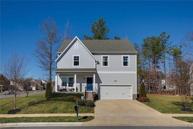 view of front of home with covered porch, concrete driveway, an attached garage, a front yard, and roof with shingles