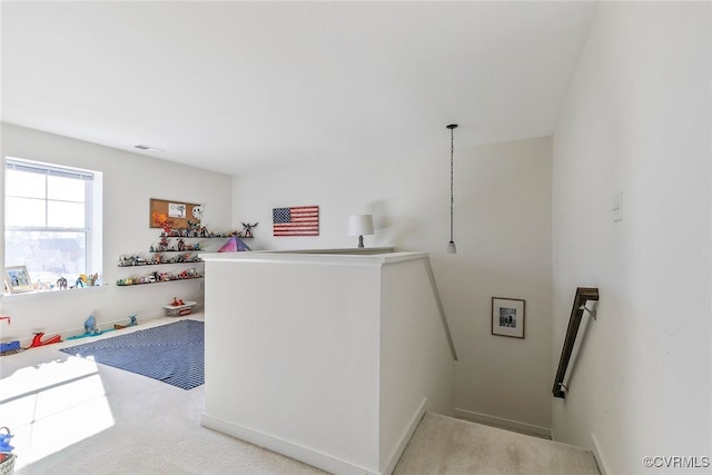 washroom with visible vents and carpet floors