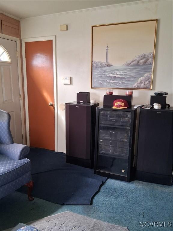 interior space featuring wine cooler and carpet floors