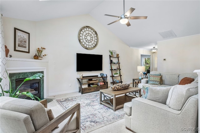 carpeted living room featuring a ceiling fan, visible vents, baseboards, a fireplace, and vaulted ceiling