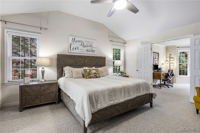 bedroom with light colored carpet, baseboards, a ceiling fan, and vaulted ceiling