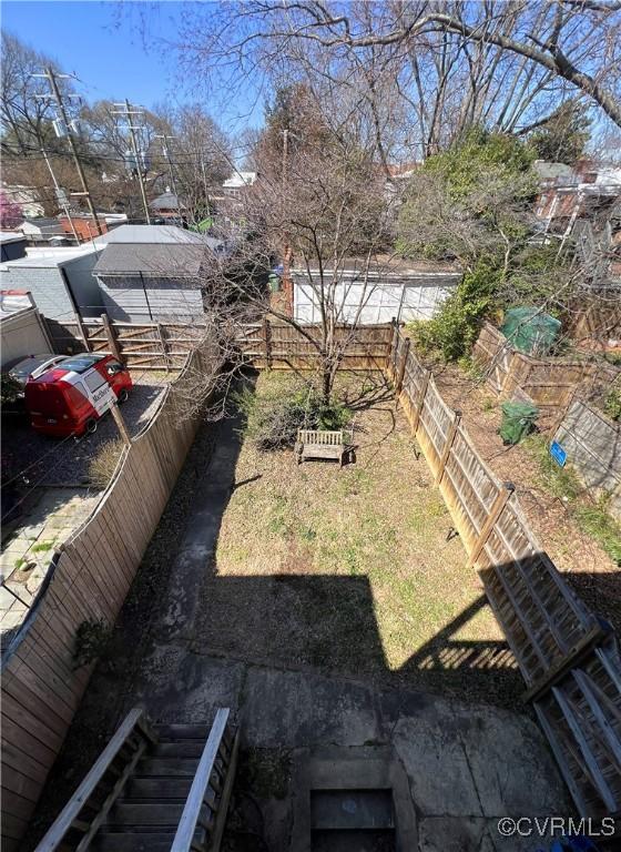 view of yard with fence