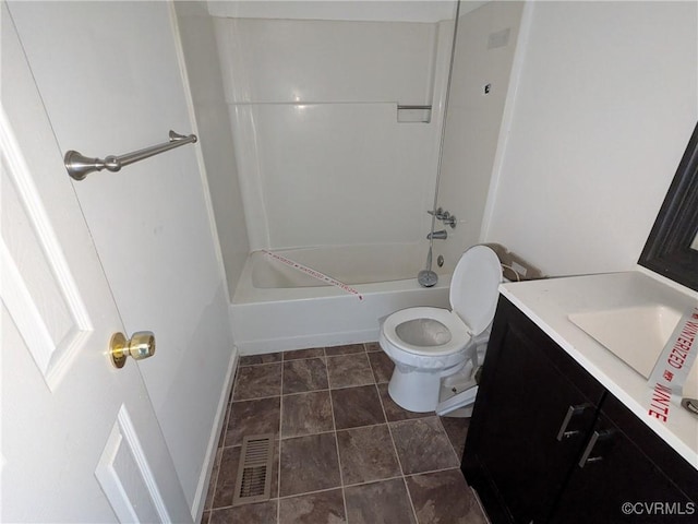 bathroom featuring visible vents, washtub / shower combination, toilet, tile patterned floors, and vanity