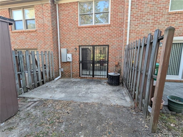 view of patio featuring fence