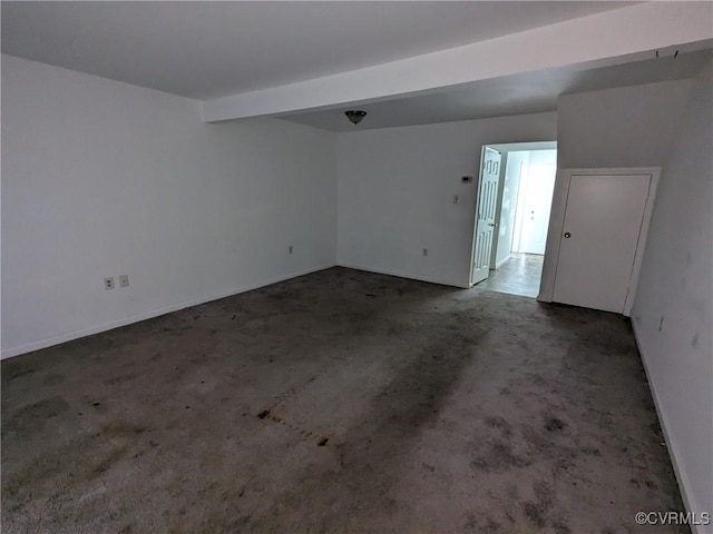 spare room featuring carpet flooring